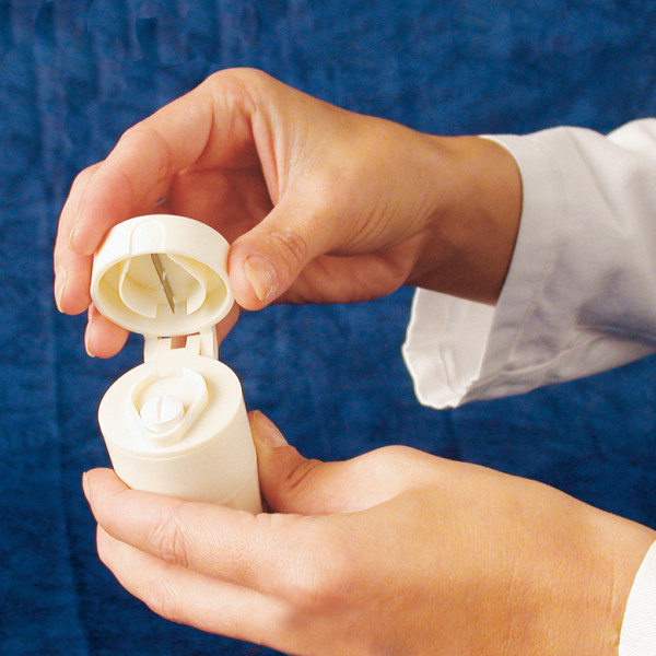 Pastillero partidor y triturador.